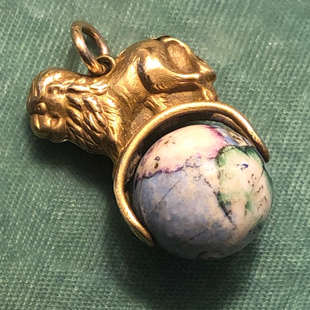 Victorian pinchbeck old world lion fob.